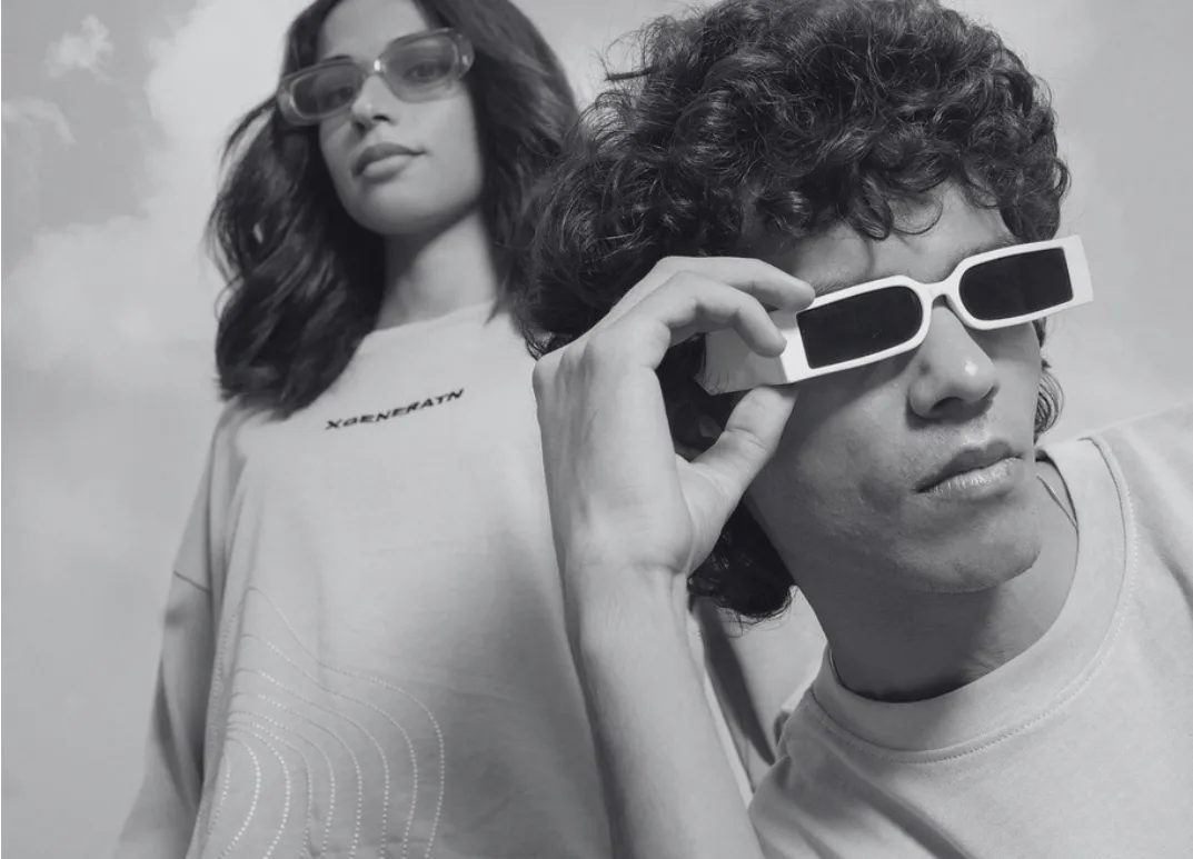 Amo Amorre campaign: two models in oversized tees and sunglasses