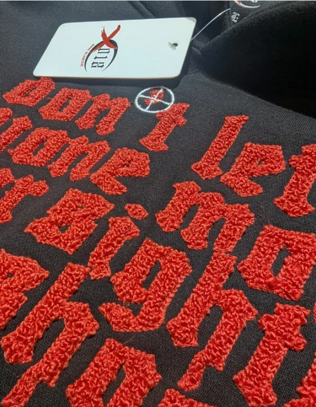 Chenille lettering on black fleece