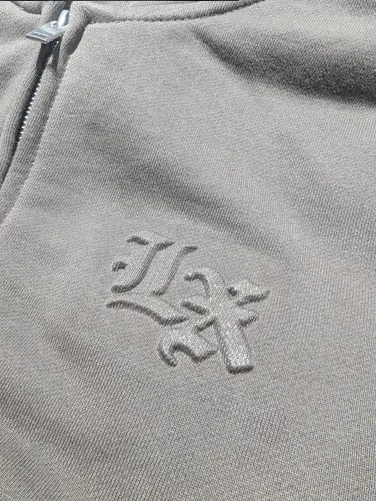 Embossed logo on grey fleece