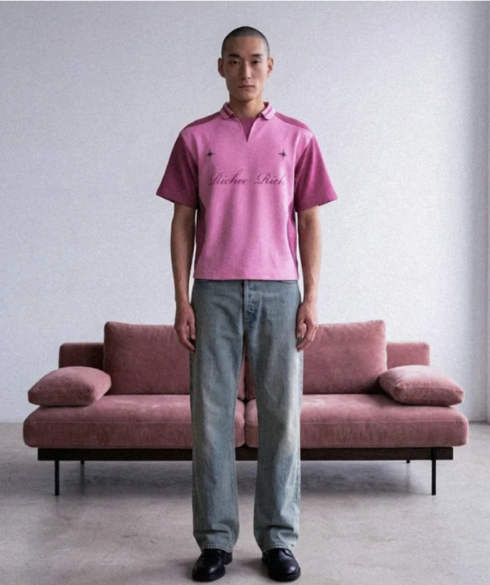 Knit polo on model in a studio shoot
