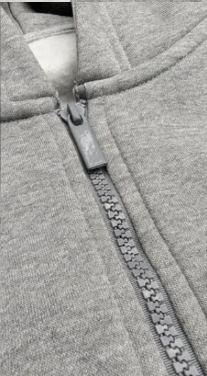 Metal zip detail on a grey hoodie
